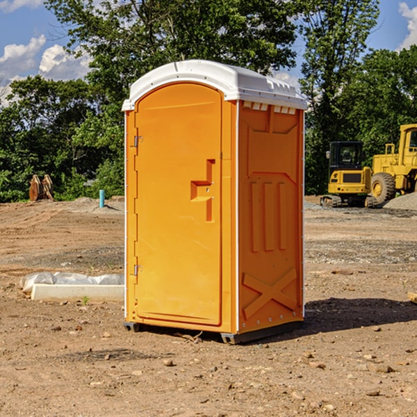 how often are the portable restrooms cleaned and serviced during a rental period in Covington GA